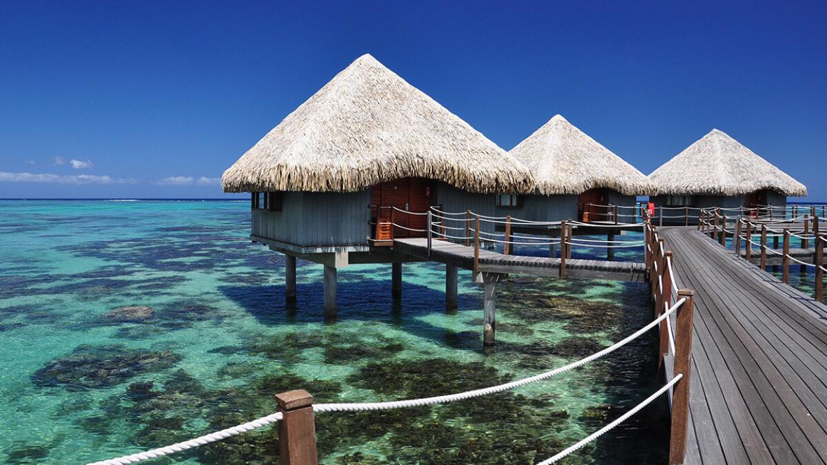 Papeete, Tahiti, offers overwater bungalows that lull you to sleep in your room on stilts.