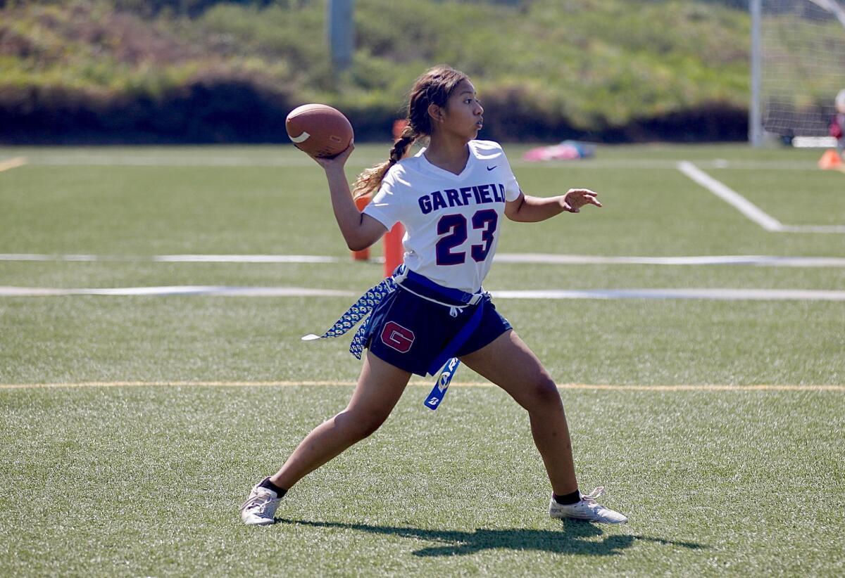 Garfield quarterback Gisselle Galicia throws pass during the Rams' Flag Football Jamboree.