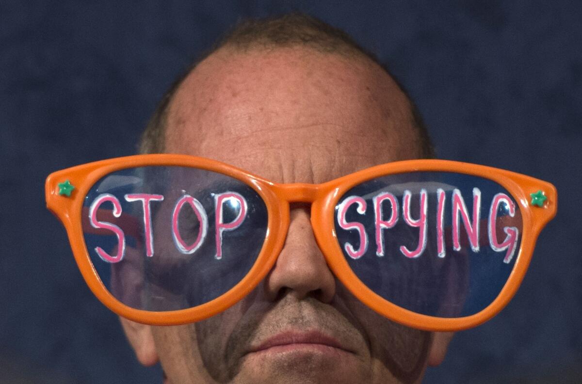 A protester with the organization Code Pink at a hearing in October 2013 in which National Security Agency Director General Keith Alexander testified before the House Intelligence Committee on the Foreign Intelligence Surveillance Act.