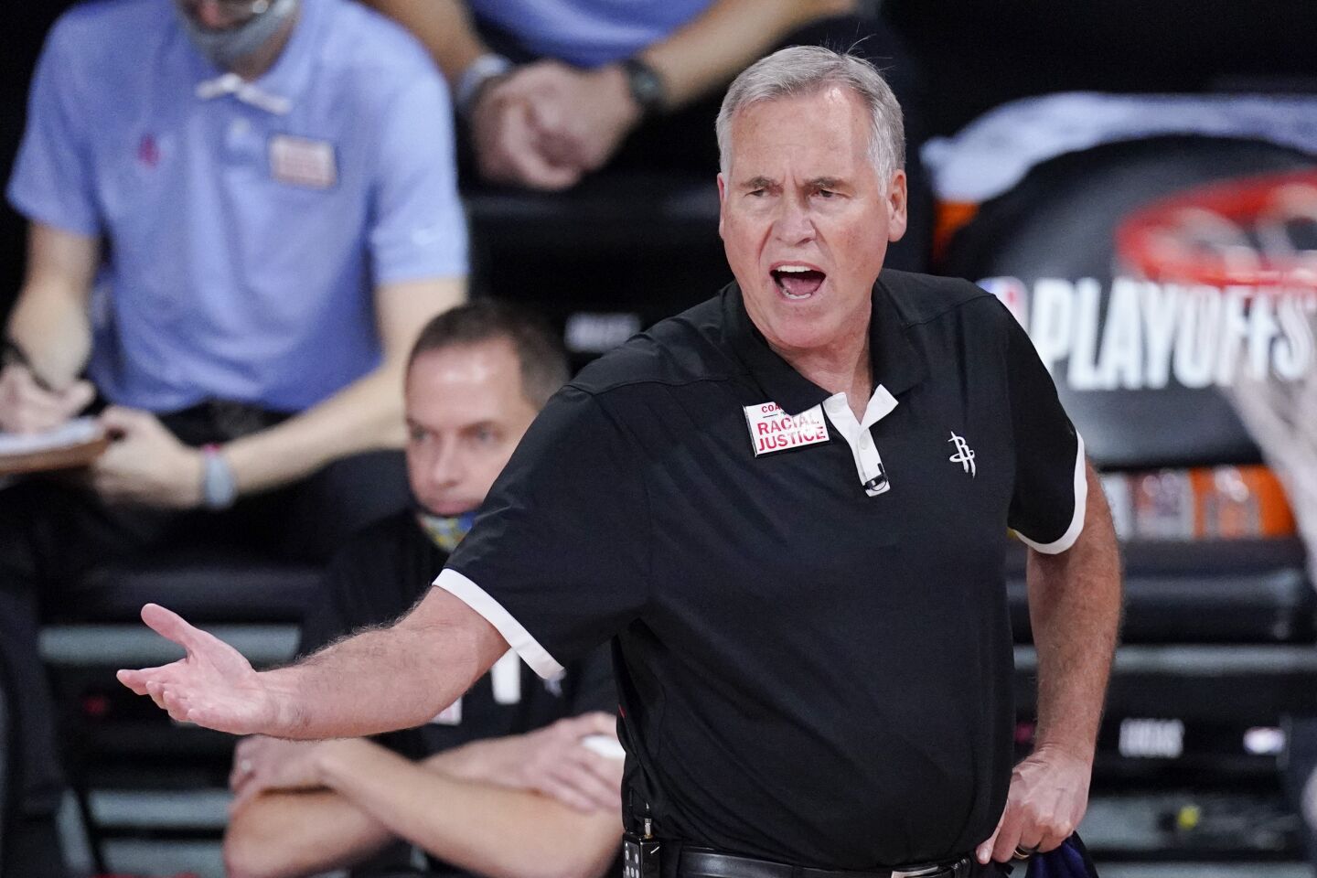 Houston coach Mike D'Antoni yells from the bench during the second half against the Lakers.