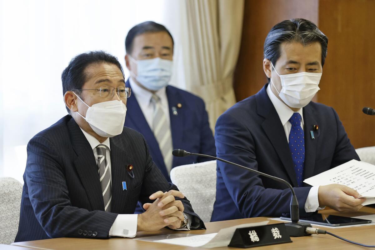 Japanese Prime Minister Fumio Kishida with party colleagues