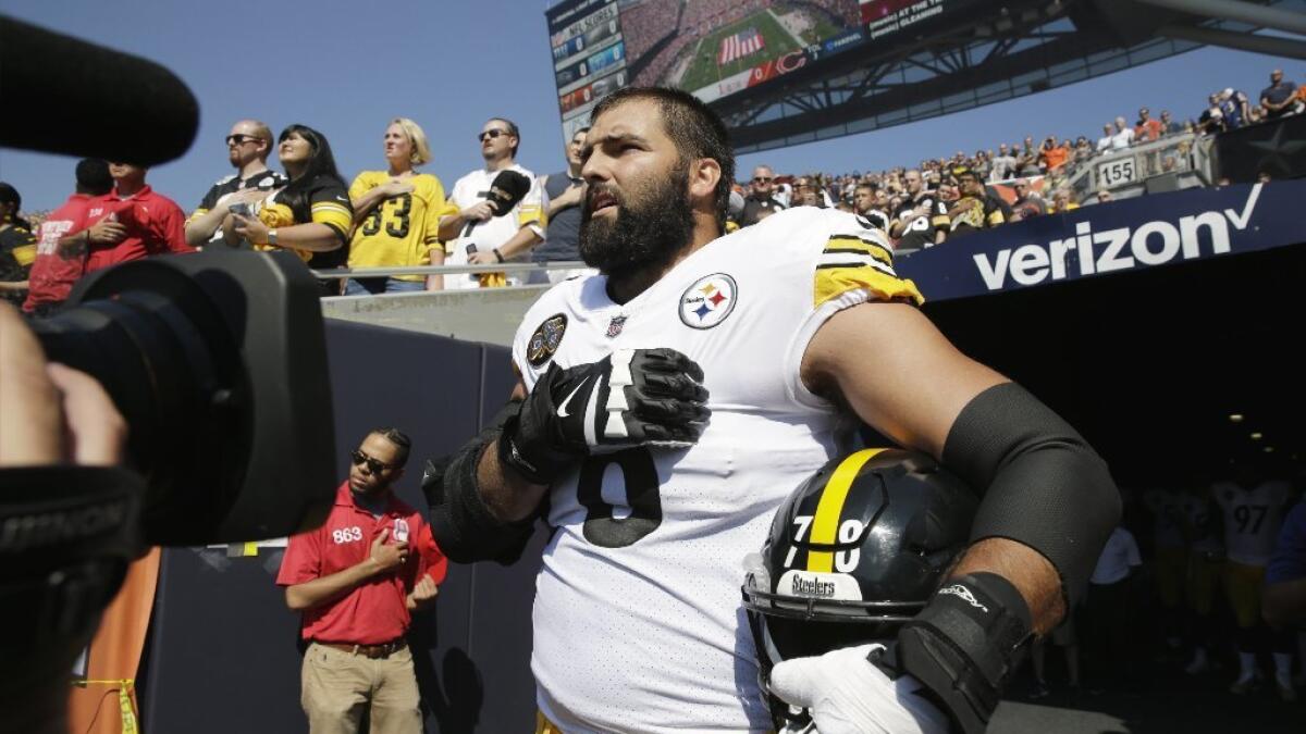 Jaguars protest racial injustice with helmet stickers at Titans game