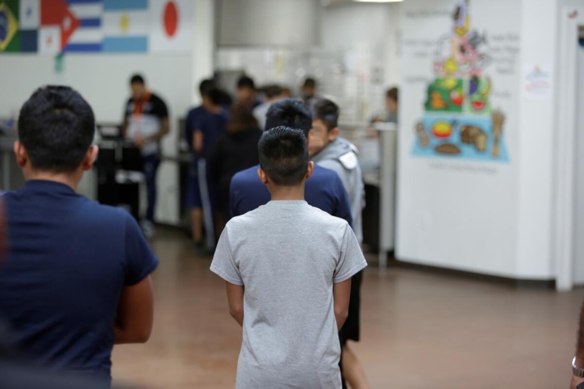 Boys are held at a migrant youth shelter this week in Brownsville, Texas.