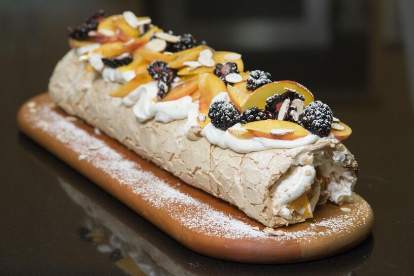 The super popular Brit-Israeli chef comes to the test kitchen with his recipe developer to make a fruit Pavlova (meringue and cream dessert) from their new cookbook.