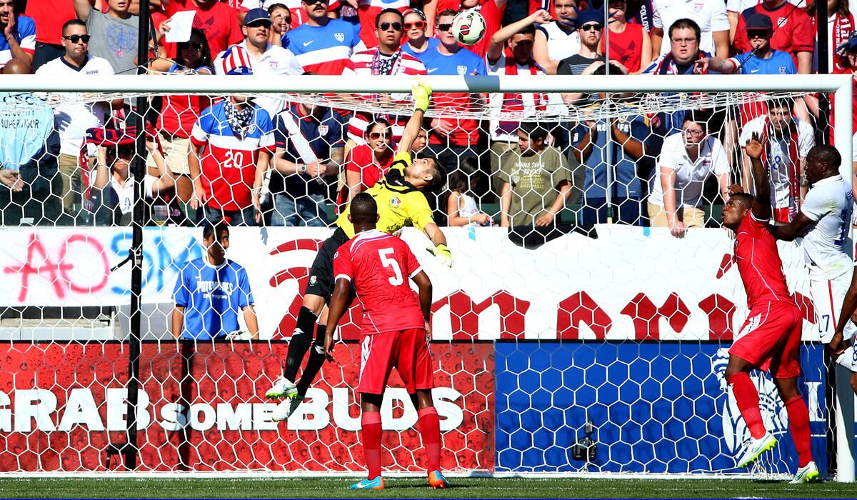 Galaxy goalkeeper Jaime Penedo can't make the save for Panama during an international friendly match against USA on Feb. 8. Penedo will be replaced by Trey Mitchell while injured.