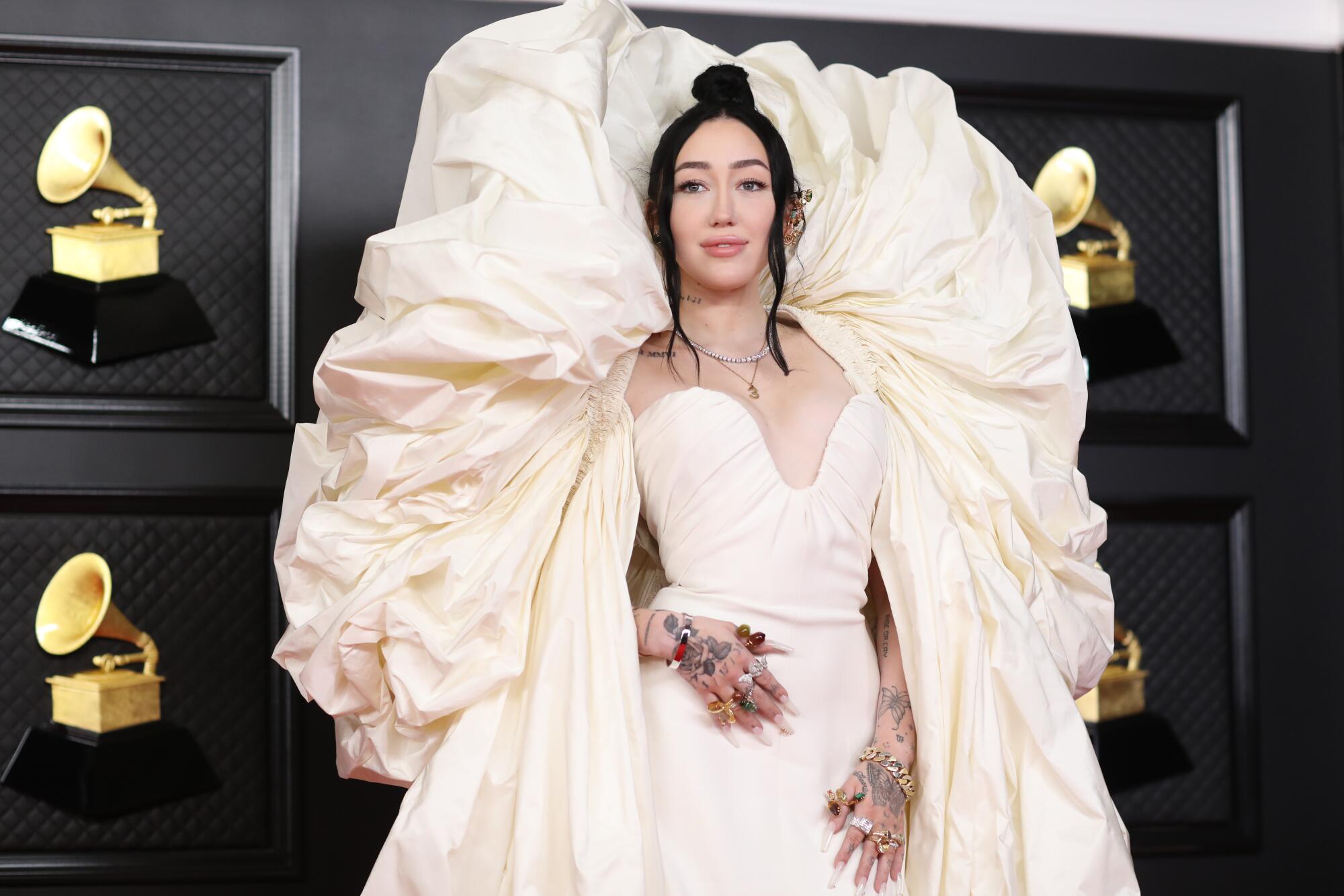 Noah Cyrus on the red carpet at the 63rd Grammy Awards.