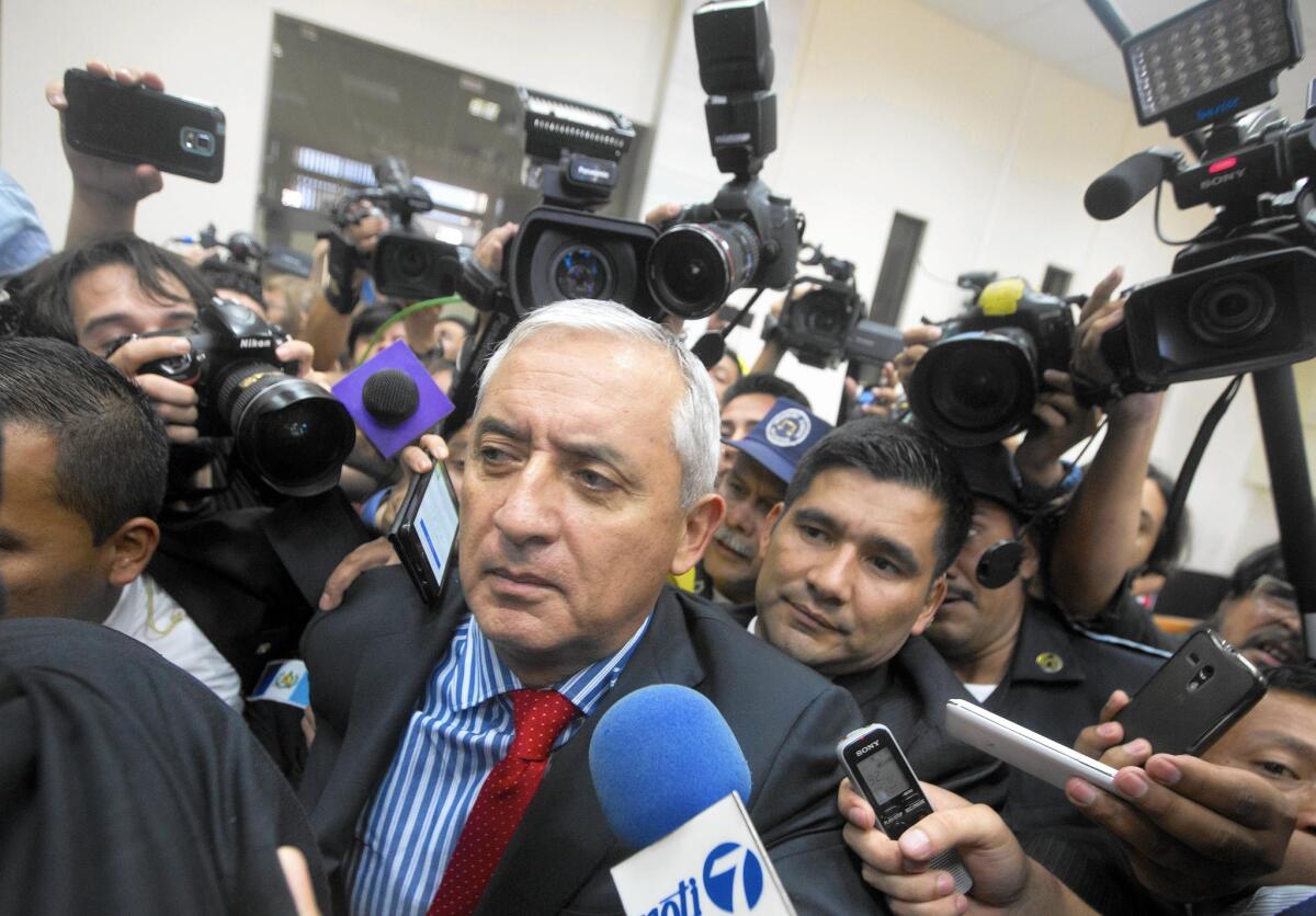 Guatemala's President Otto Perez Molina arrives in court to face corruption charges, after submitting his resignation in Guatemala City on Sept. 3, 2015.
