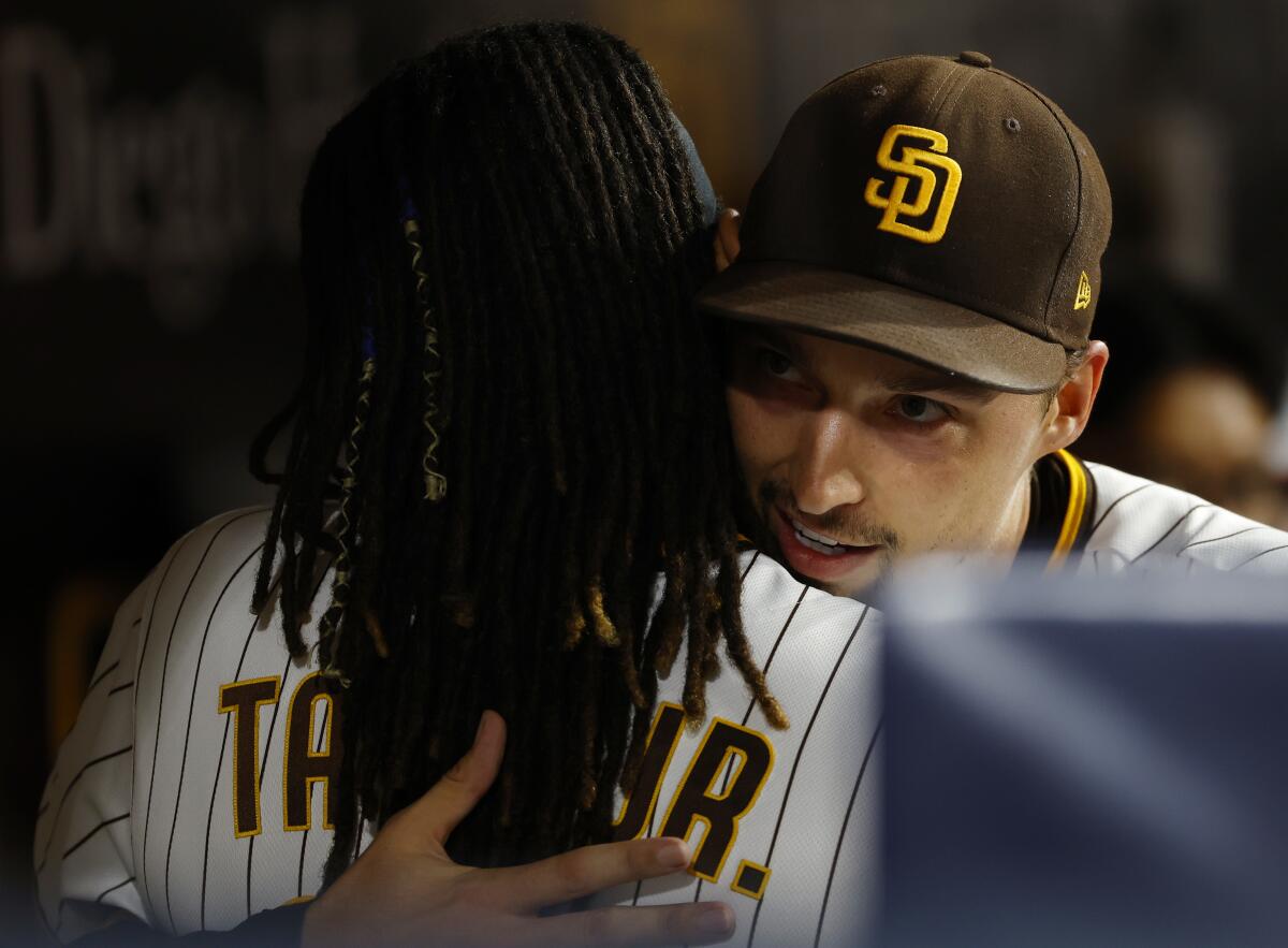 SD pitcher Blake Snell takes a minute before Game 1 to talk