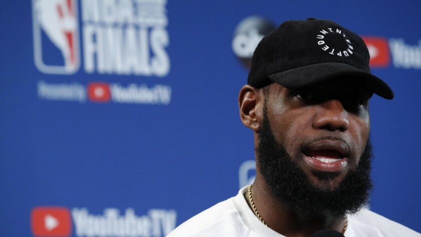 LeBron James responds to a question during a press conference after practice the day before Game 2 of the NBA Finals at Oracle Arena, in Oakland on June 2, 2018.