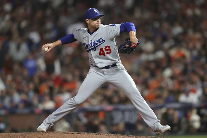 Los Angeles Dodgers' Blake Treinen pitches against the San Francisco Giants during the seventh inning.