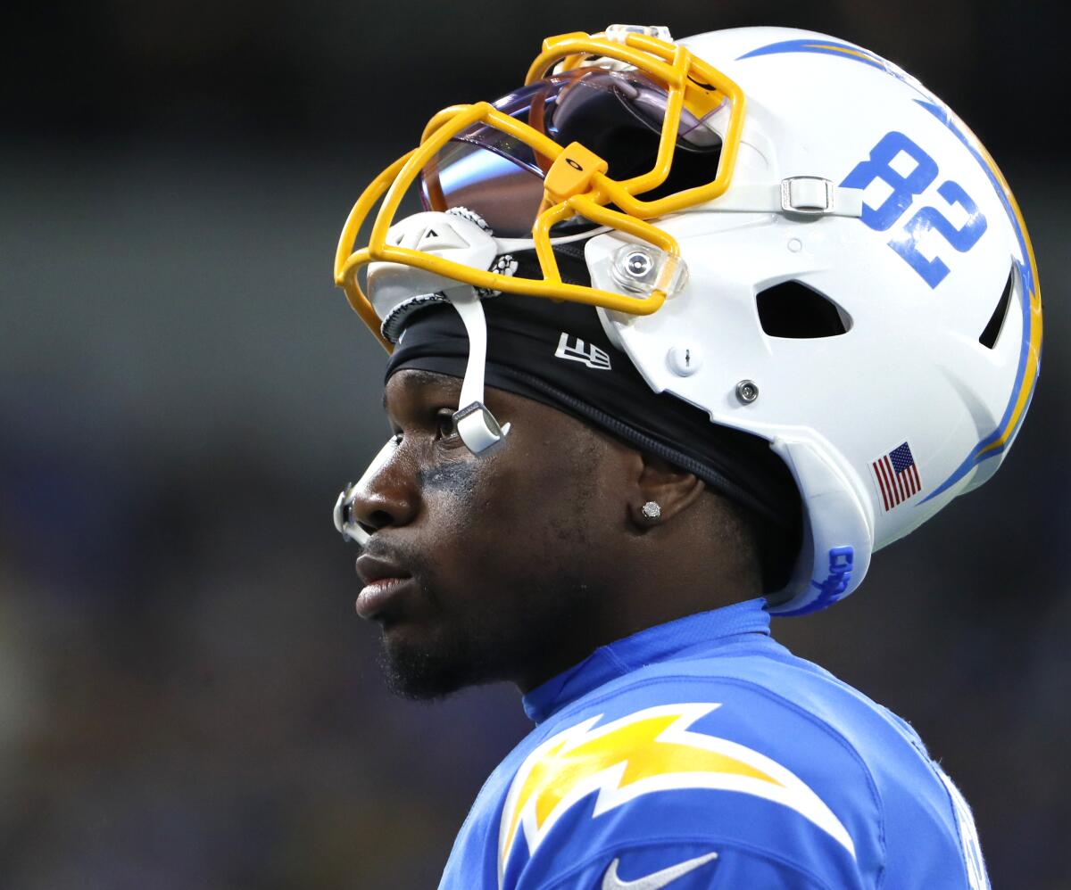 Chargers kick returner DeAndre Carter stands on the sideline during a preseason game.