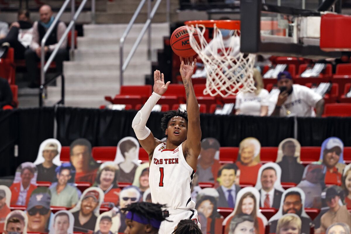Texas Tech's Terrence Shannon Jr. (1) shoots the ball during the first half of an NCAA college basketball game against Kansas State, Tuesday, Jan. 5, 2021, in Lubbock, Texas. (AP Photo/Brad Tollefson)