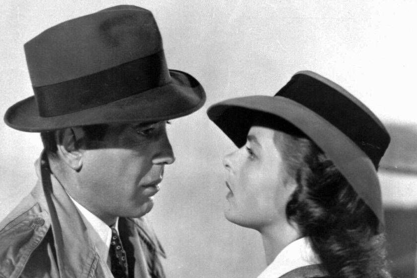 Story Slug: Features FILE--Swedish-born actress Ingrid Bergman, right, with Humphrey Bogart in a scene from the classic 1943 film "Casablanca." "Citizen Kane'' and "Casablanca'' have a real love-hate thing going on among Hollywood screenwriters. An informal survey, sent to 4,500 members of the Writers Guild of America of screenwriters, ranked those two as the best movie scripts ever but also as two of the most overrated. The survey results are based on about 175 responses received so far. (AP Photo/File) ORG XMIT: NY138