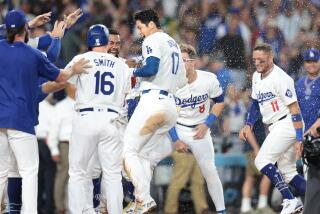 Los Angels, California August 23, 2024-Dodgers Shohei Ohtani celebrates his grand slam.