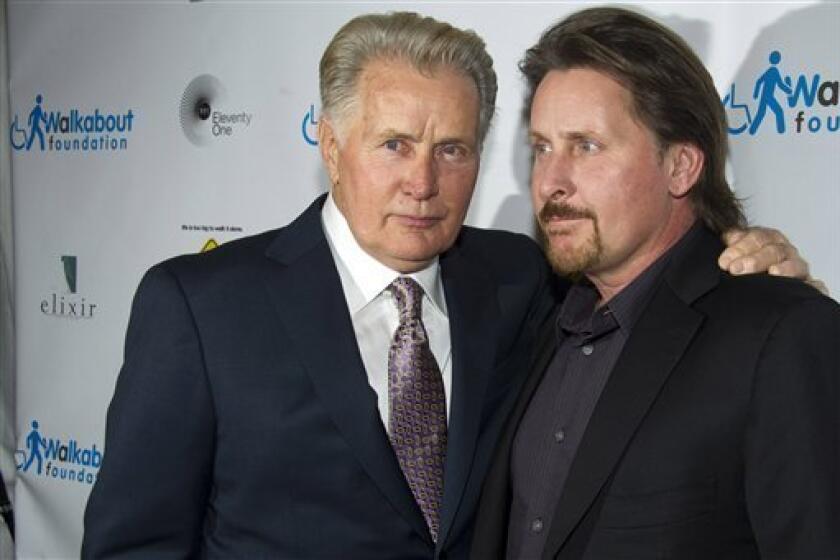 Martin Sheen, left, and Emilio Estevez attend the premiere of "The Way", in New York, Wednesday, Oct. 5, 2011. (AP Photo/Charles Sykes)