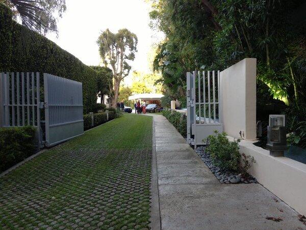 A long driveway leads to a car collector's home in Hollywood Hills West. A BMW party sparked interest in the nearly $8-million listing.