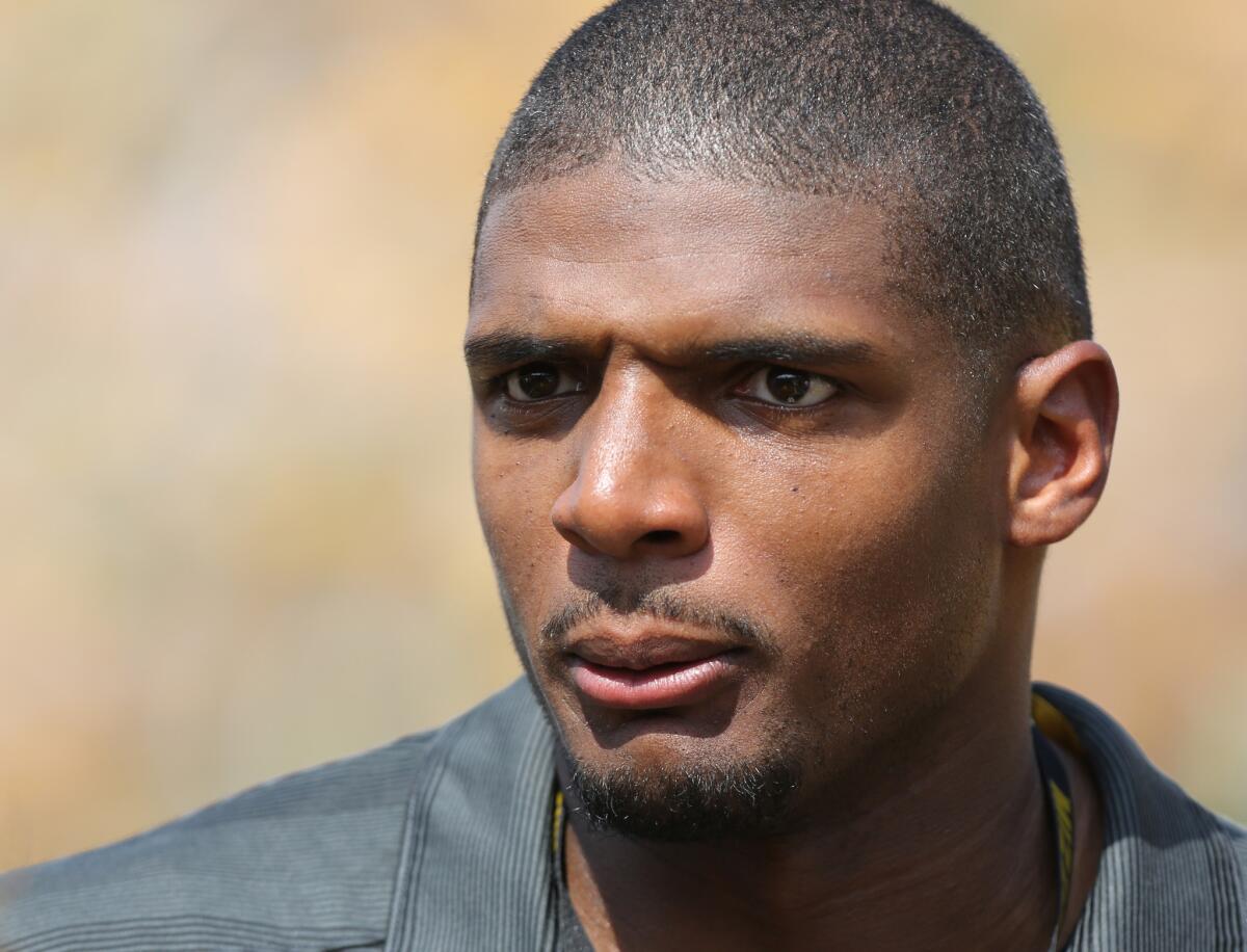 Michael Sam attends a Missouri-South Dakota State football game in Columbia, Mo., on Aug. 30.
