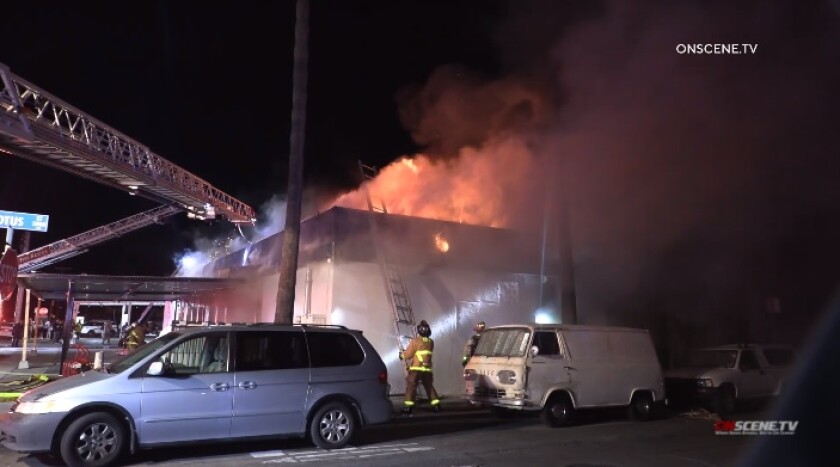 Firefighters battle a fire Jan. 22 at the Northside Tavern restaurant in Ocean Beach.