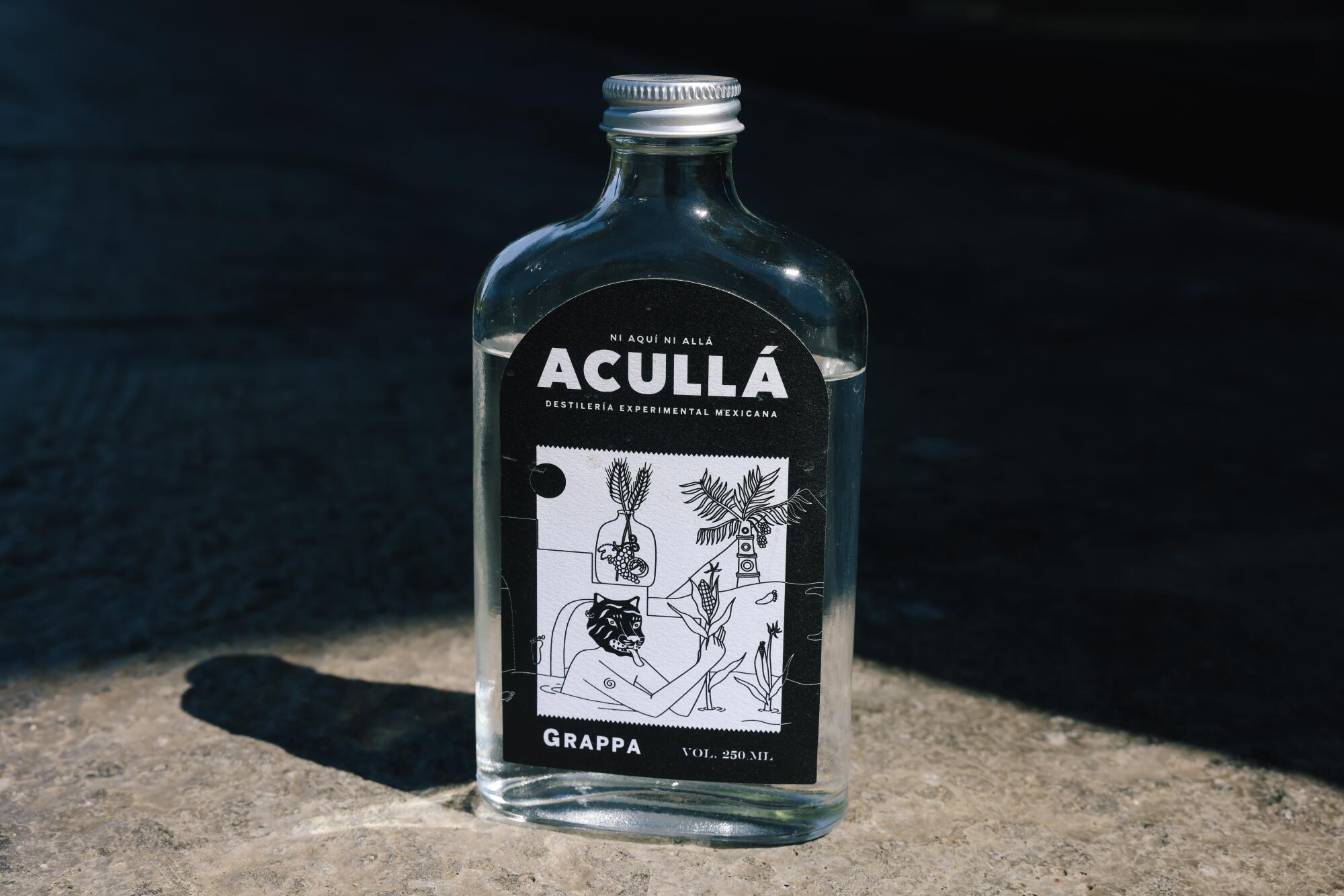 A bottle of Aculla Grappa.