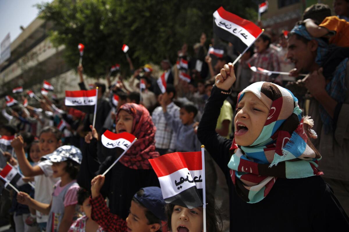 Yemeni children protest Saudi-led airstrikes in Sana on June 6.