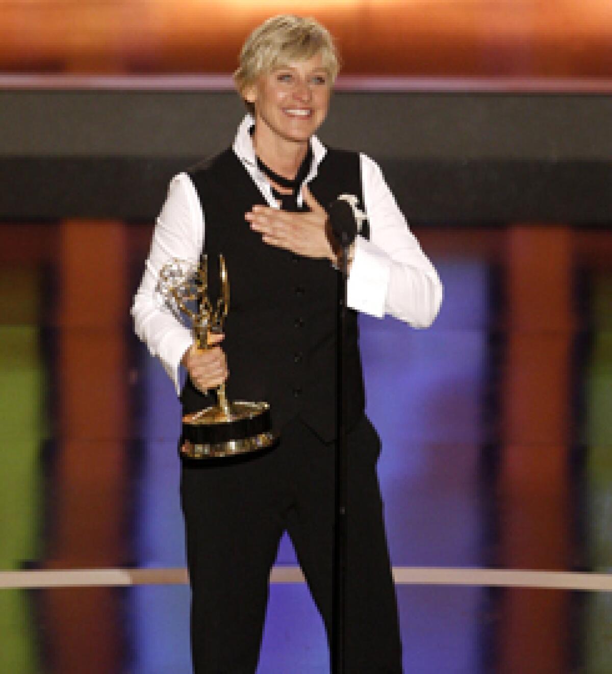 Ellen DeGeneres picked up her fourth consecutive Daytime Emmy for outstanding talk show host.