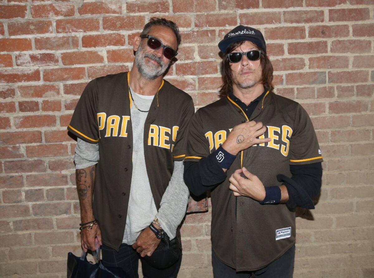 Jeffrey Dean Morgan and Norman Reedus attend The Walking Dead Walker Horde at Petco Park during Comic-Con 2019 on July 20, 2019 in San Diego, California.