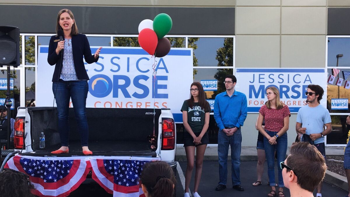 Democrat Jessica Morse, 36, addresses supporters at a May barbecue and rally in Roseville.