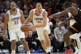 Los Angeles Clippers center Mason Plumlee (44) moves the ball up court against the Phoenix Suns.