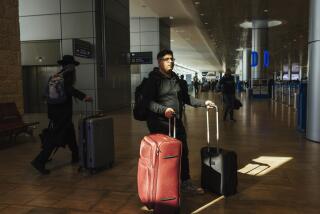 Yoel Levy, a Lev Tahor survivor, prepares to board a flight to the U.S.