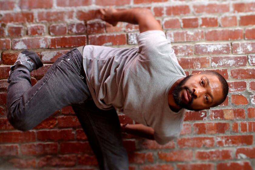 EAGLE ROCK, --APRIL 27, 2017-- Choreographer Kyle Abraham, founder of the dance company, Abraham.In.Motion (A.I.M.), is photographed at Coffee Table, in Eagle Rock, CA, April 27, 2017. (Jay L. Clendenin / Los Angeles Times)