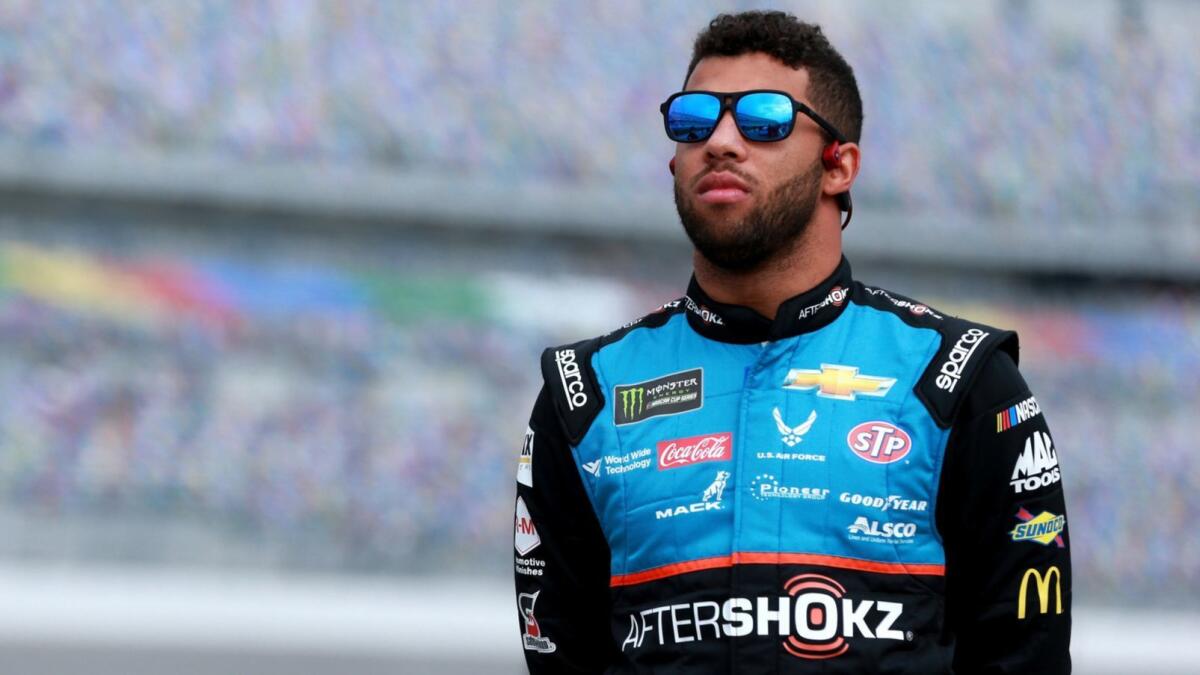 Bubba Wallace stands on the grid at Daytona International Speedway on Feb. 10.