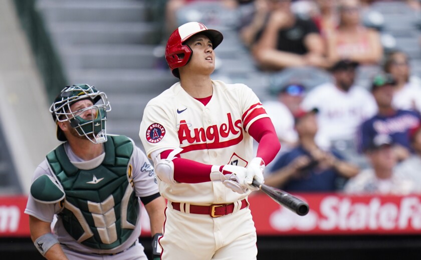 Angels star Shohei Ohtani hits a solo home run in the eighth inning of an 8-7 loss to the Oakland Athletics on Thursday.