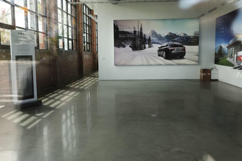 NEW YORK, NEW YORK - APRIL 25: An empty Tesla showroom stands in Brooklyn on April 25, 2019 in New York City. The electric car company announced on Wednesday that it lost $702 million last quarter. Tesla revenue was also down 37% compared to the prior quarter. (Photo by Spencer Platt/Getty Images) ** OUTS - ELSENT, FPG, CM - OUTS * NM, PH, VA if sourced by CT, LA or MoD **