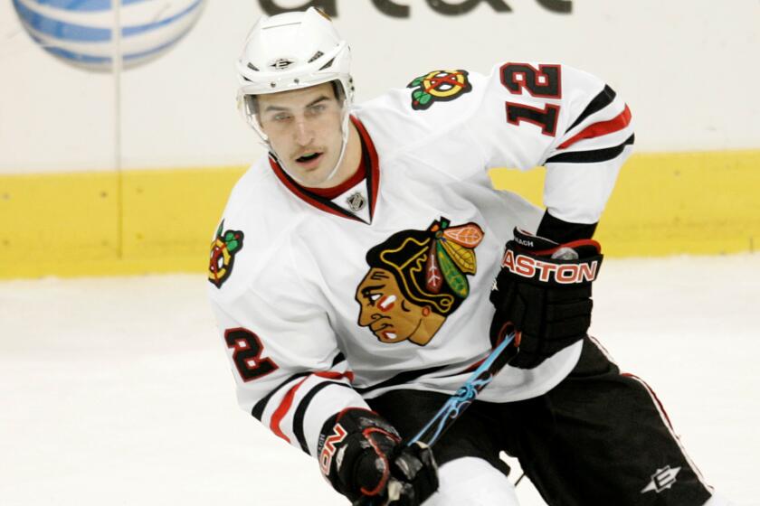 Chicago Blackhawks' Kyle Beach controls the puck during a preseason game against the Dallas Stars on Oct. 2, 2008.