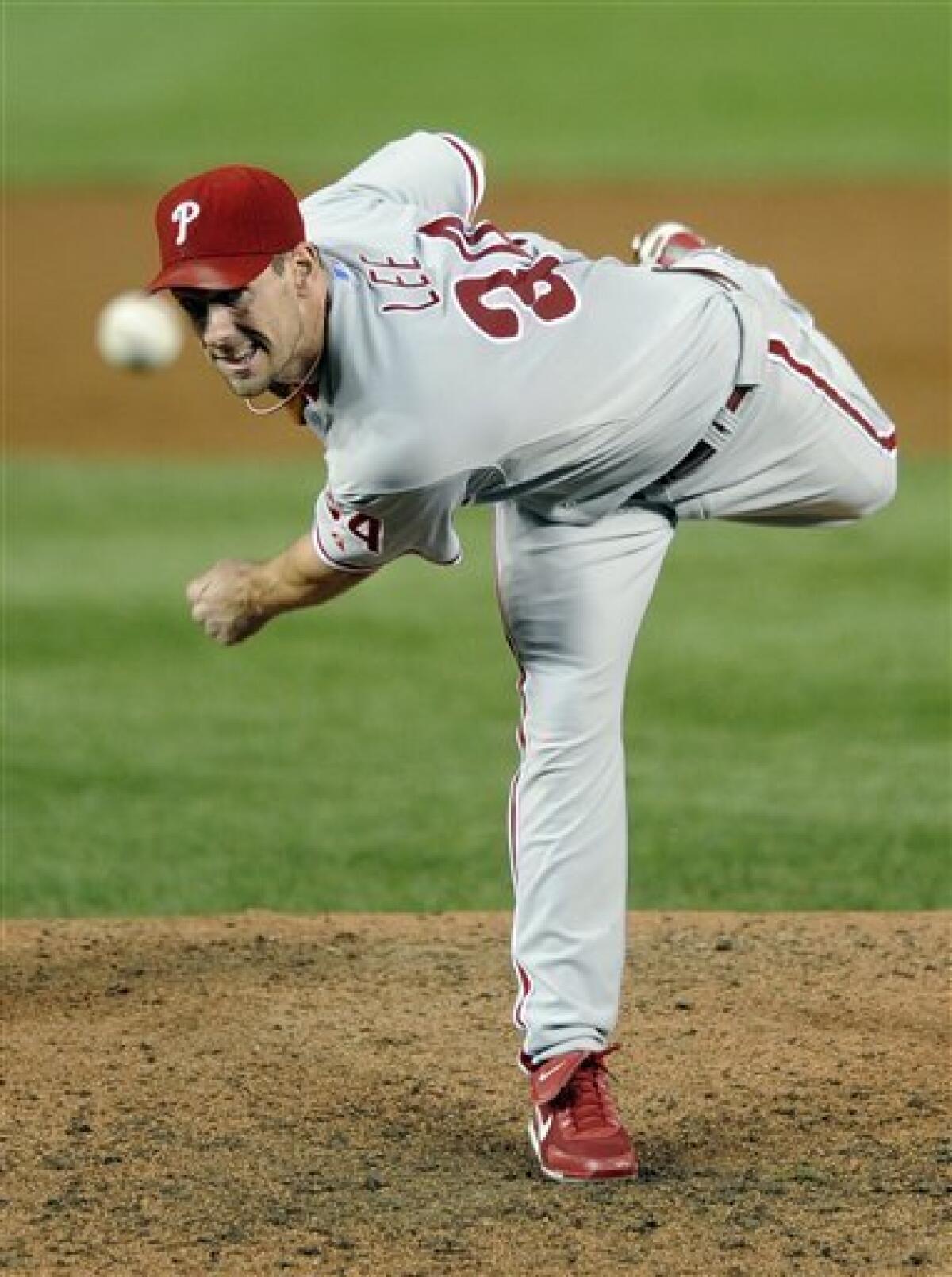 From left, Philadelphia Phillies pitchers Roy Oswalt, Joe Blanton