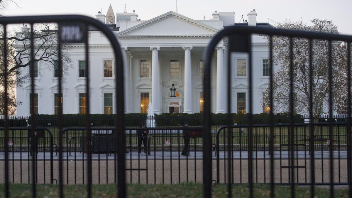 A White House official turned whistleblower says dozens of people in President Trump's administration were granted access to classified information despite "disqualifying issues" in their backgrounds including concerns about foreign influence, drug use and criminal conduct.