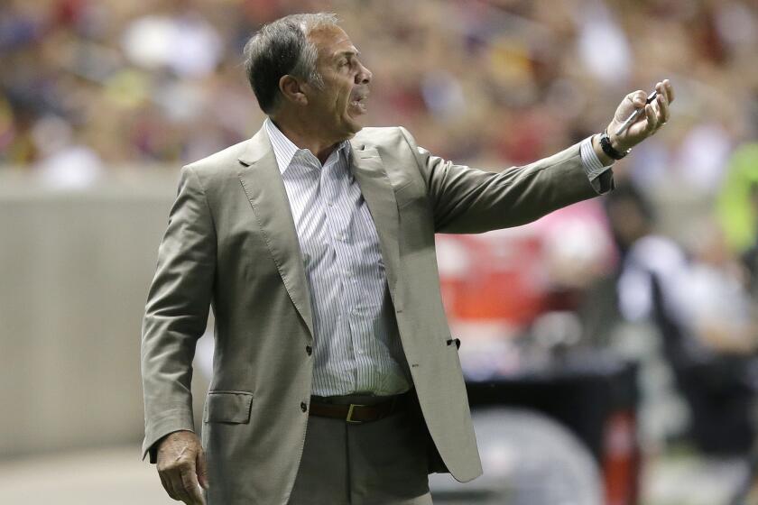Galaxy Coach Bruce Arena shouts to his team during the first half of a match against Real Salt Lake on Sept. 7.