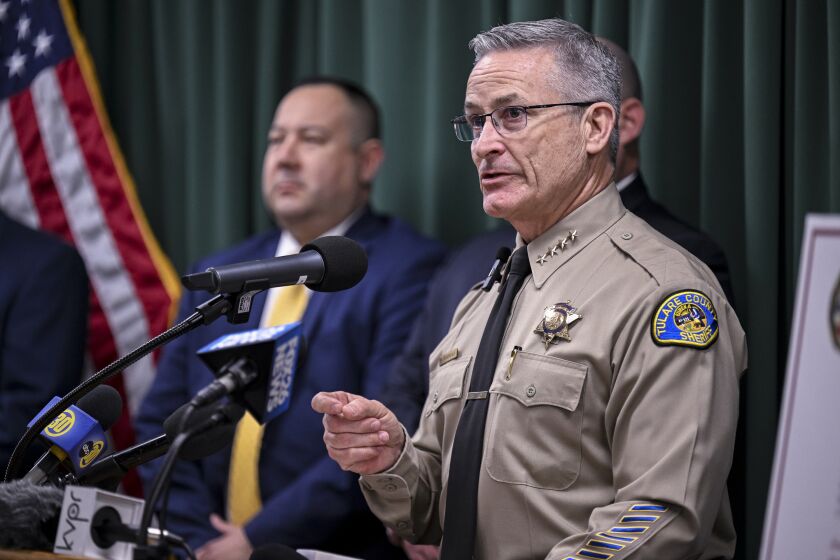 Tulare County Sheriff Mike Boudreaux speaks Monday, Jan. 30, 2023, about new developments in the investigation of a mass shooting that occurred January 16, in Goshen, Calif. Two weeks after shooters brazenly killed a teen mother, her 10-month-old baby and four other members of her household, the suspects remain at-large. Authorities on Monday provided no motive for the attack in a central California farming community. (Ron Holman/The Times-Delta via AP)