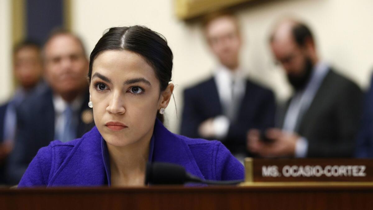 Rep. Alexandria Ocasio-Cortez (D-N.Y.) during a House Financial Services Committee hearing in Washington on April 10.