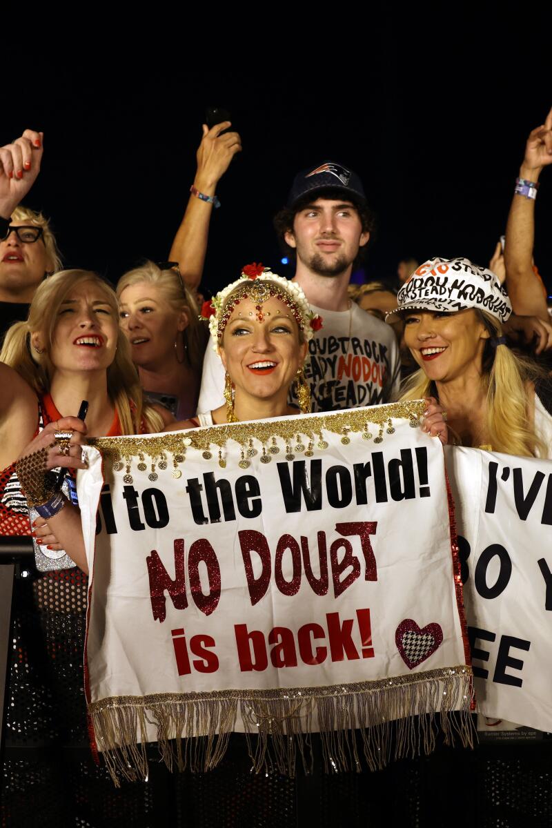 No Doubt fans hold up signs at Coachella.