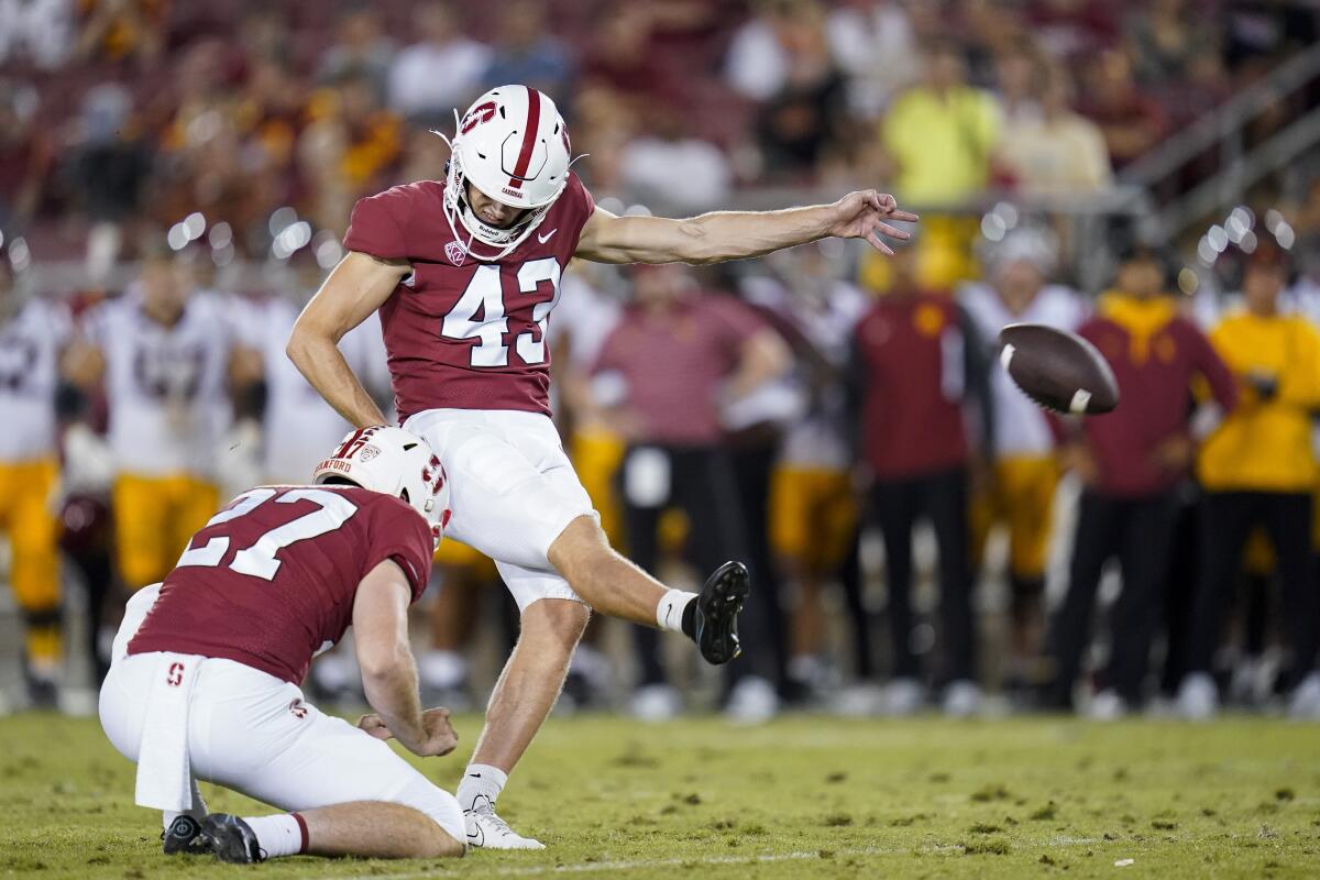 Joshua Karty kicks a field goal for Stanford.
