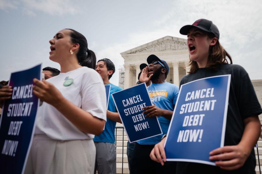 WASHINGTON, DC - JUNE 30: Student Loan Forgiveness Advocates rally outside of Supreme Court of the United States after the nation's high court stuck down President Biden's student debt relief program on Friday, June 30, 2023 in Washington, DC. In a 6-3 decision the Supreme Court stuck down the Biden administration's student debt forgiveness program in Biden v. Nebraska. (Kent Nishimura / Los Angeles Times)