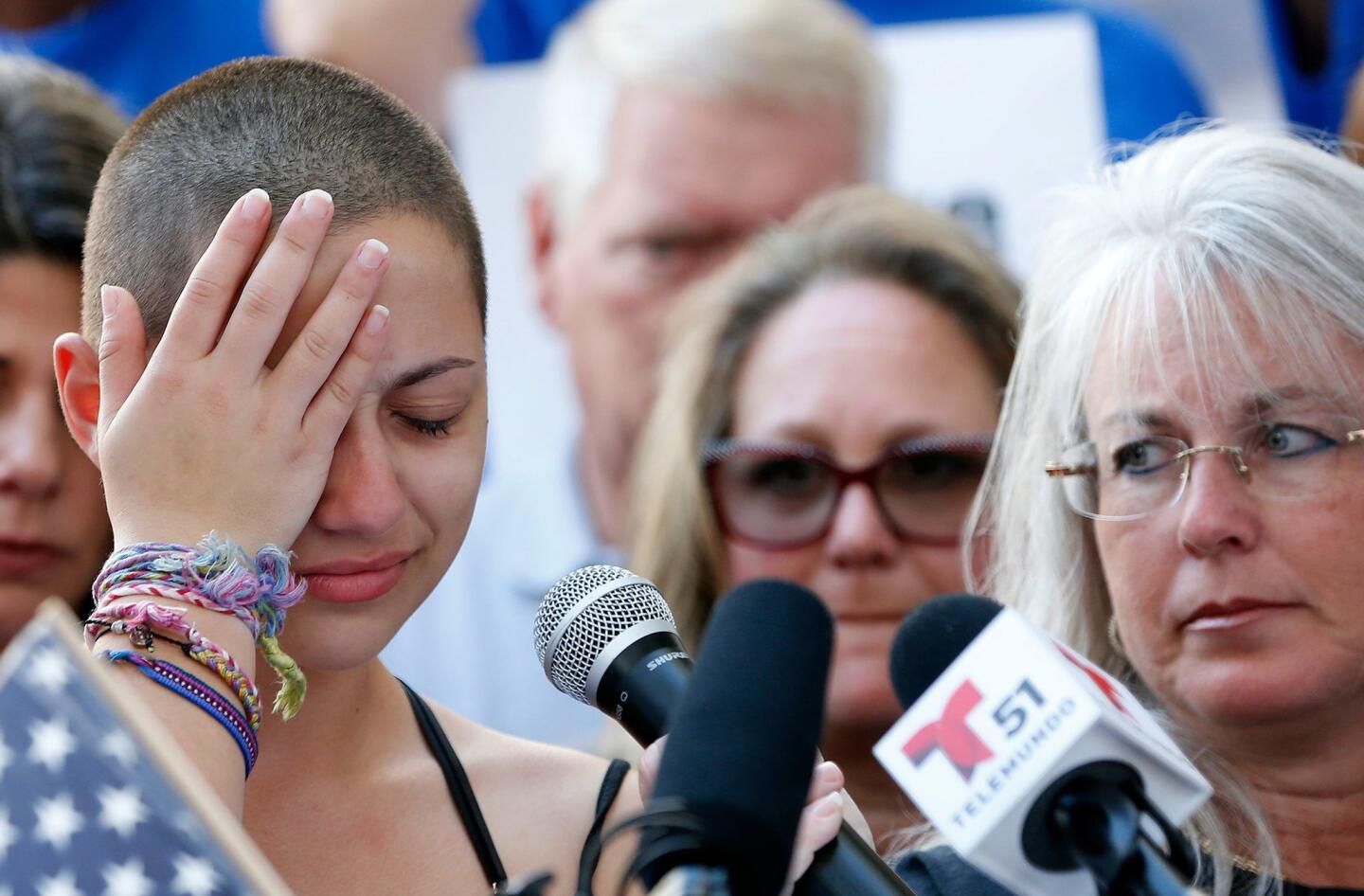 Marjory Stoneman Douglas High School student Emma Gonzalez reacts during her speech at a rally for gun control at the Broward County Federal Courthouse in Fort Lauderdale, Fla. on Feb. 17, 2018. "To every politician taking donations from the NRA, shame on you!" Gonzalez said.