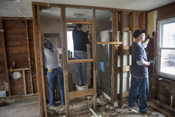Volunteers with Jersey Shore Calvary Chapel help gut a damaged home in Lavallette, N.J., weeks after Superstorm Sandy.