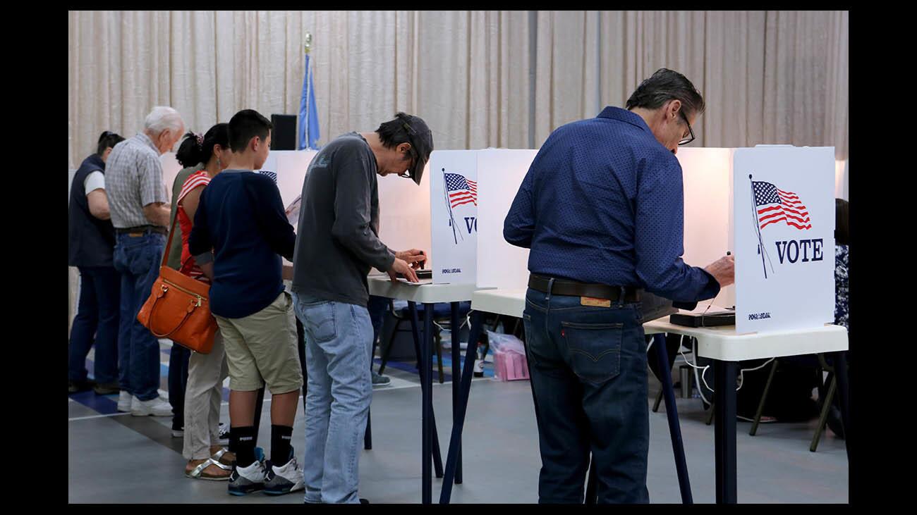 Locals who came out to vote filled the voting booths at the Youth Center polling station, in Burbank on Tuesday, June 5, 2018. The center was used for multiple precincts.
