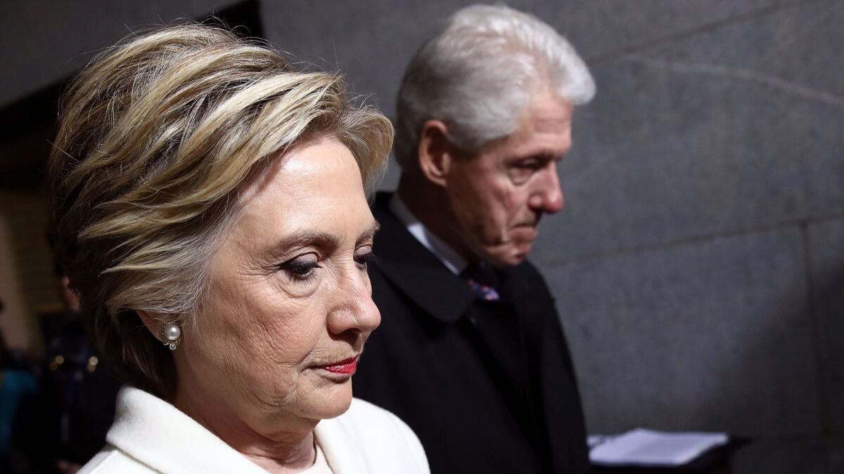 Hillary and Bill Clinton are seen at the U.S. Capitol building before President Trump's inauguration on Jan. 20, 2017.
