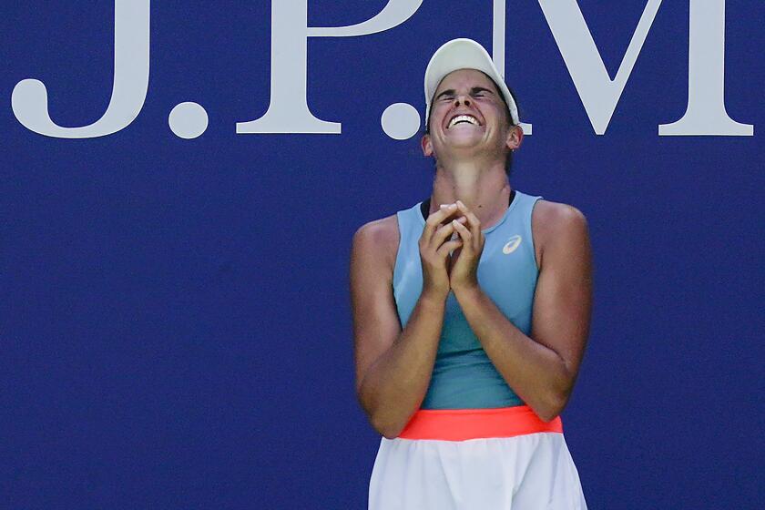 Jennifer Brady, of the United States, reacts after defeating Angelique Kerber, of Germany, during the fourth round of the US Open tennis championships, Sunday, Sept. 6, 2020, in New York. (AP Photo/Seth Wenig)