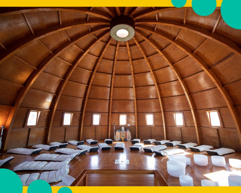 Interior of the Integratron with a curved wood ceiling.