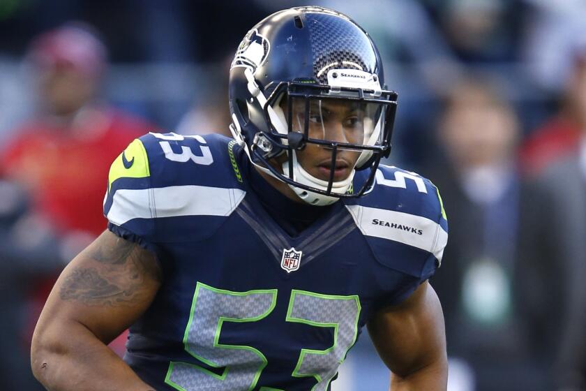 Seattle Seahawks linebacker Malcolm Smith moves in to make a tackle during a game against the San Francisco 49ers on Dec. 14.