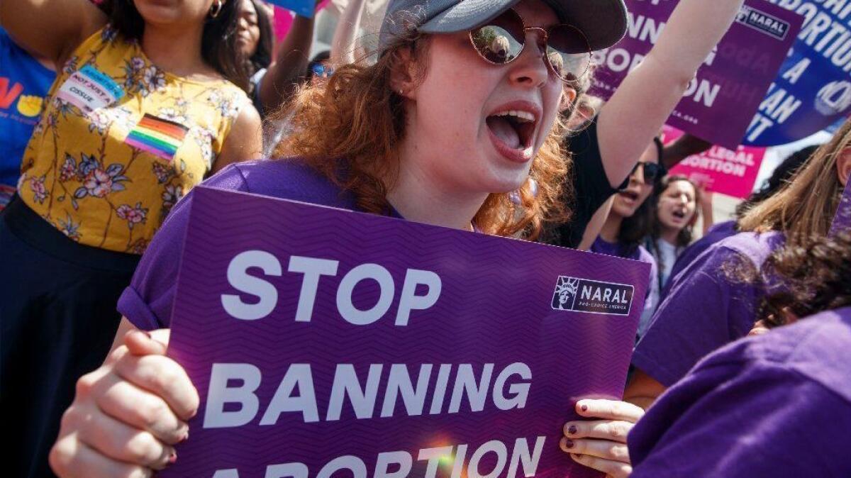 Abortion rights activists protest at the Supreme Court in Washington this month.
